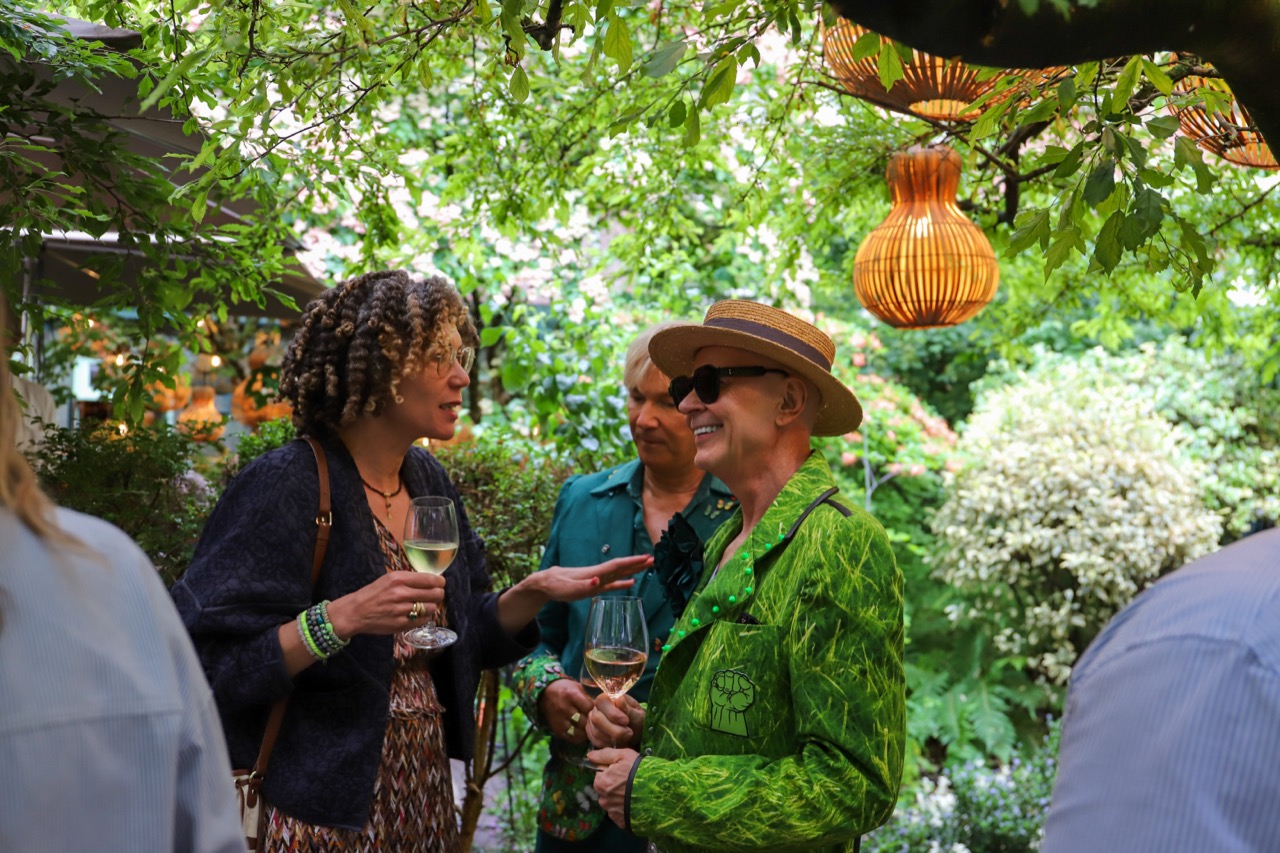 Guests enjoying the summer garden